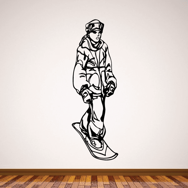 Snowboarding wall decal of black snowboarder holding a snowboard