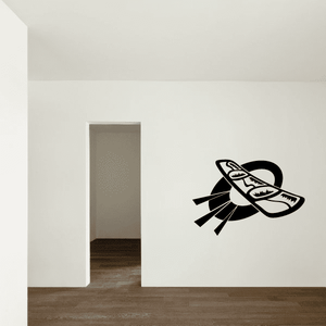 Snowboarding vinyl wall decal with black snowboard graphic and motion lines