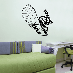 Snowboarding vinyl wall decal of a black-and-white snowboard with rider silhouette