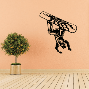 Black snowboard wall decal of a crouching rider with board