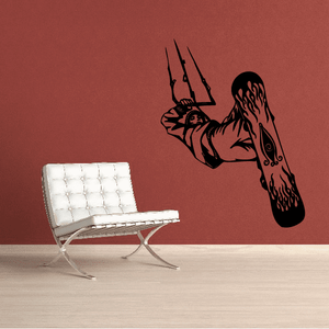 Black snowboarding wall decal with a rider silhouette holding a board