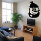 Snowman wall decal with black beanie and scarf, circular cartoon face design