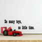 Toy wall decal with red truck and text: So many toys, so little time.