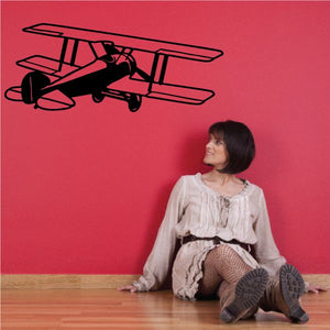 Black detailed biplane wall decal with twin wings and propeller