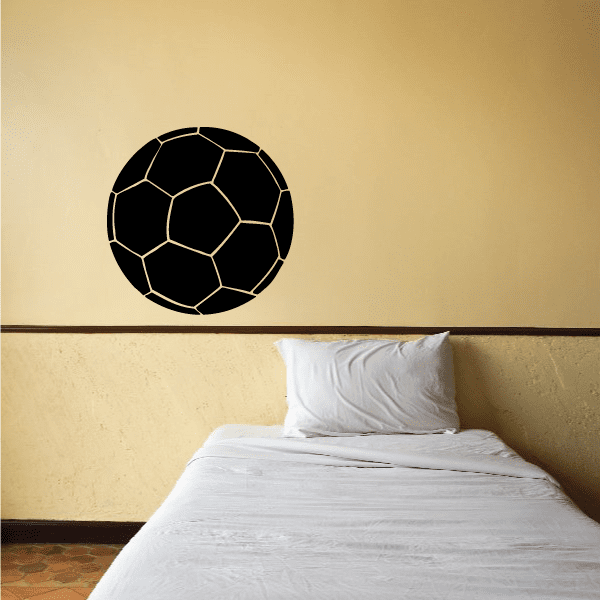 Soccer ball wall decal with black design and yellow outline, round football pattern