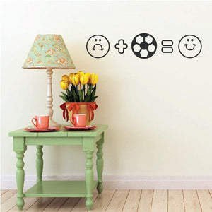 Soccer-themed vinyl wall decal with smiley faces, plus sign, and soccer ball icon