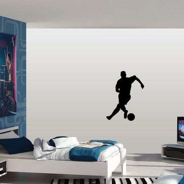Soccer player dribbling decal with black silhouette and soccer ball
