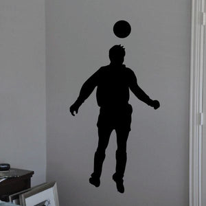 Soccer player header wall decal with black soccer player silhouette and ball above head