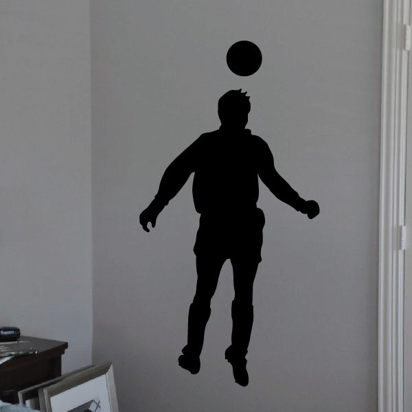 Soccer player header wall decal with black soccer player silhouette and ball above head