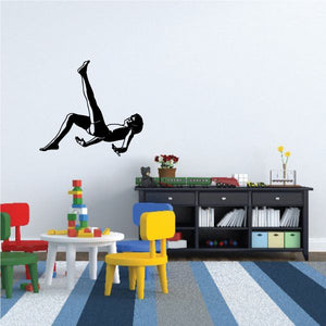 Black soccer player vinyl wall decal, one figure kicking a ball