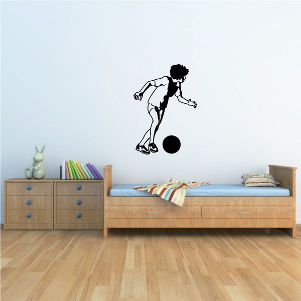 Soccer player wall decal with black silhouette kicking a soccer ball