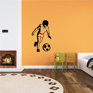 Soccer player wall decal kicking a soccer ball, vinyl