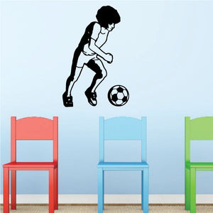 Soccer player wall decal: black silhouette kicking a soccer ball.
