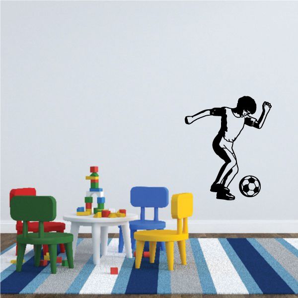 Soccer wall decal vinyl sticker of black player kicking a soccer ball