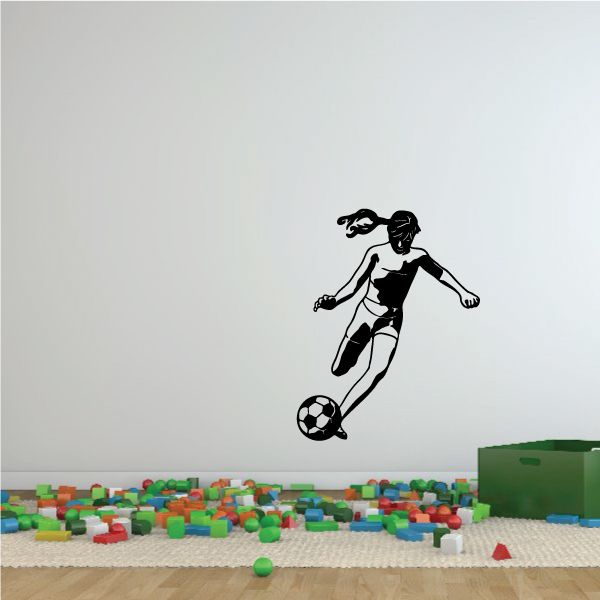 Black soccer player wall decal with kicking ball silhouette