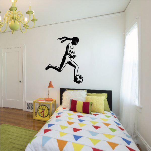 Soccer player wall decal, black silhouette kicking a soccer ball
