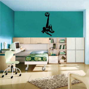 Soccer wall decal vinyl sticker featuring a black soccer player kicking a ball
