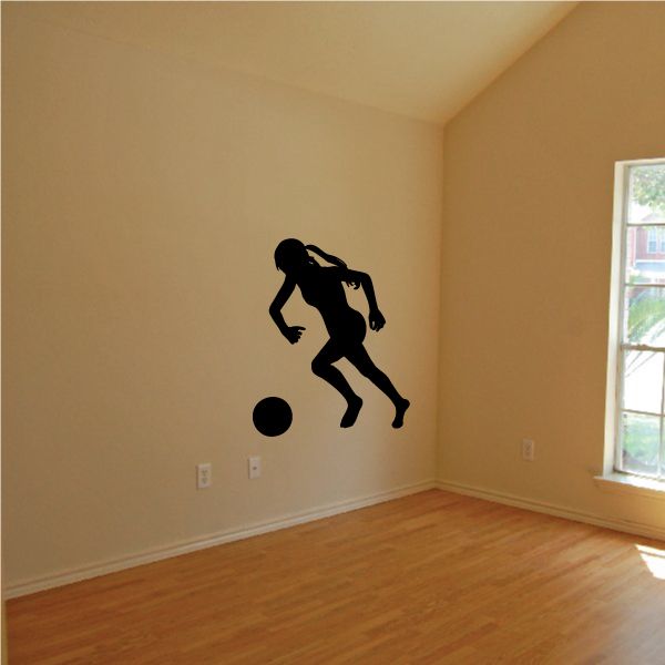 Soccer player wall decal with ball silhouette, black vinyl sticker