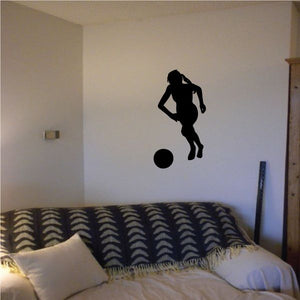 Soccer wall decal with black player silhouette and ball.