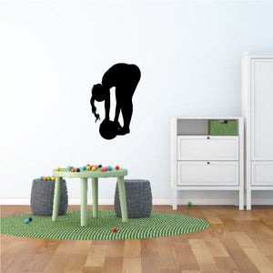 Soccer player wall decal, black silhouette holding a soccer ball