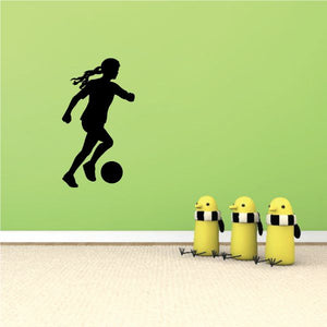 Black soccer player wall decal silhouette with ball and three yellow cylinder decals