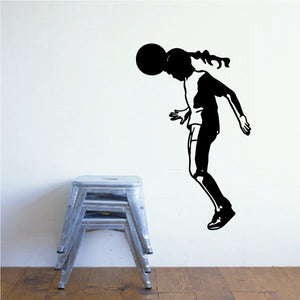 Soccer player wall decal vinyl, black silhouette in kicking ball pose