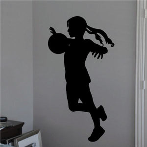 Soccer player wall decal, black vinyl silhouette of kicking footballer