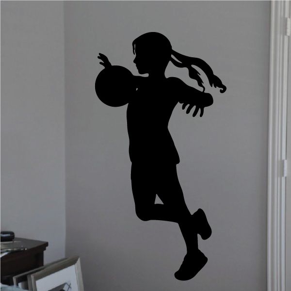 Soccer player wall decal, black vinyl silhouette of kicking footballer