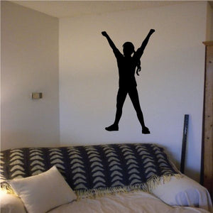 Black soccer player wall decal silhouette with arms raised