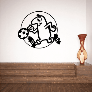 Soccer wall decal of black soccer player kicking ball inside circle outline