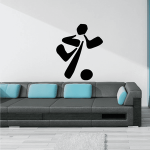 Soccer wall decal of a black soccer player silhouette with a ball