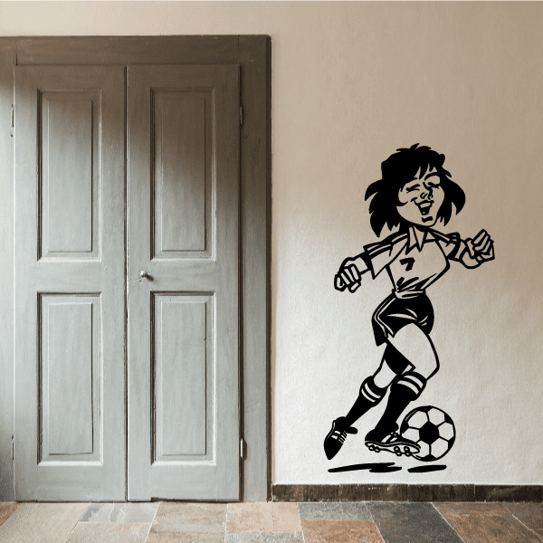Soccer wall decal of a black cartoon player dribbling a soccer ball