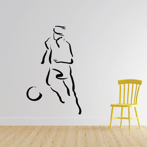 Soccer wall decal of a player silhouette with a small ball, black and white lines