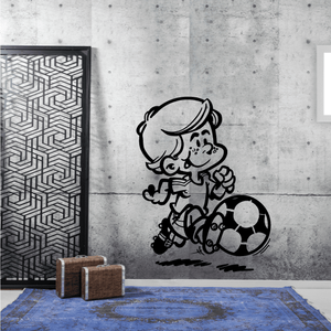 Soccer wall vinyl decal featuring a cartoon player holding a soccer ball