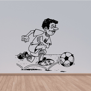 Soccer wall decal vinyl of cartoon player dribbling a soccer ball