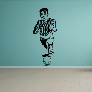 Soccer player vinyl wall decal with striped jersey and standing soccer ball