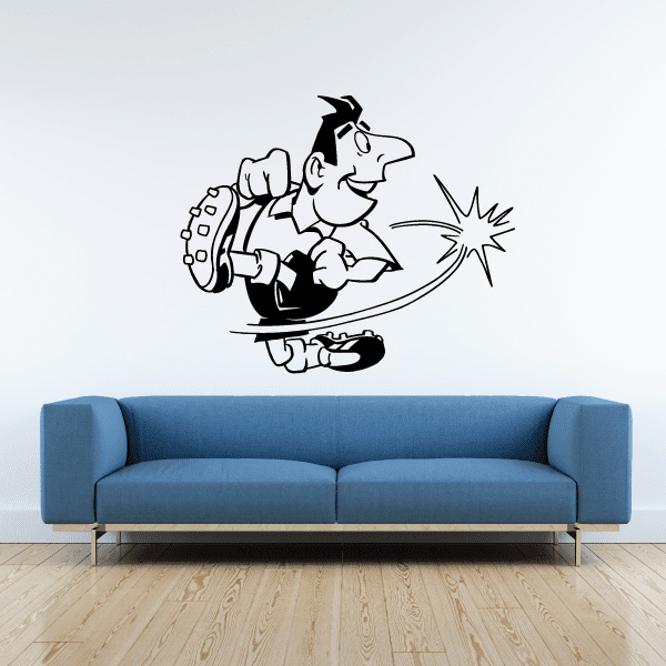 Soccer wall decal vinyl showing black cartoon soccer player kicking a ball with motion lines