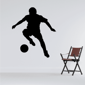 Black soccer player wall decal with ball, vinyl silhouette