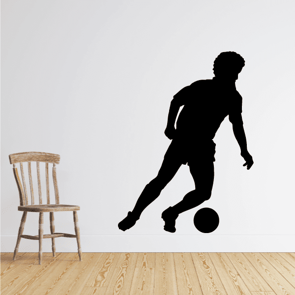 Black soccer player wall decal with ball silhouette
