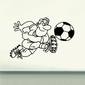 Soccer wall decal of cartoon player kicking a black-and-white soccer ball