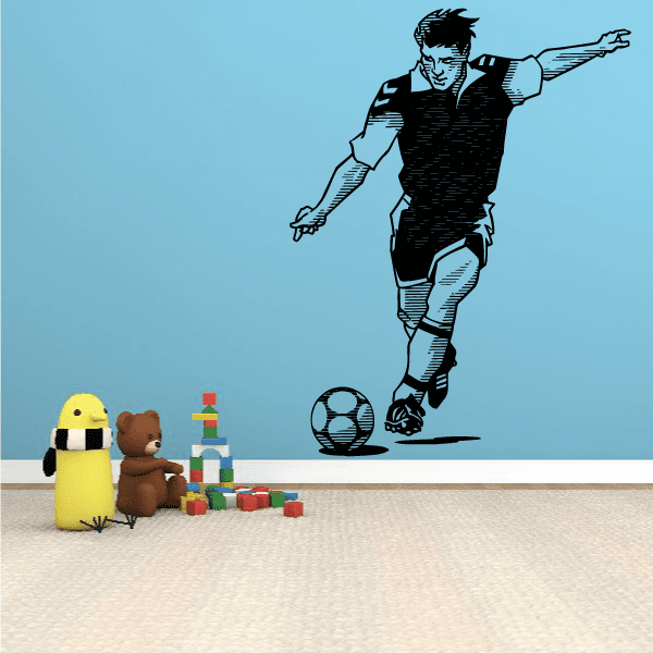Soccer wall decal featuring a black soccer player kicking a ball