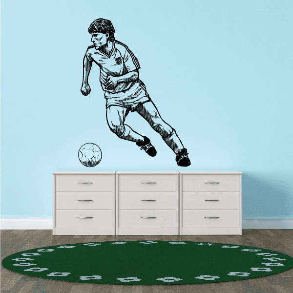 Black soccer player and ball vinyl wall decal