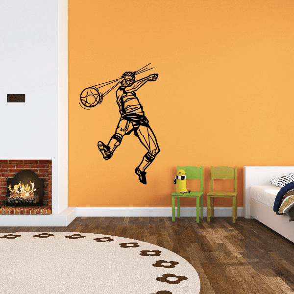 Soccer player wall vinyl decal, black outline kicking a ball