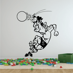 Soccer wall decal with black soccer player kicking a ball and motion lines