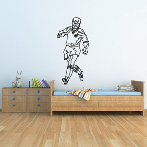 Soccer player wall vinyl decal, black line art running with ball