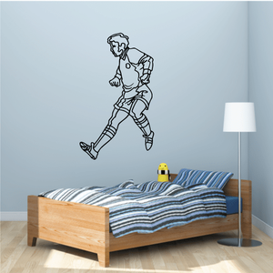 Black outline soccer player wall decal, running and kicking