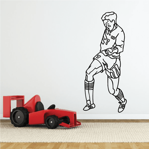 Soccer player wall decal in black outline, holding a soccer ball