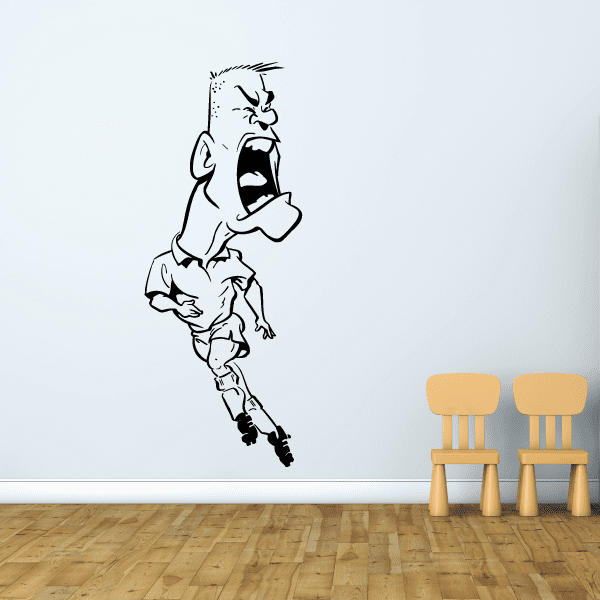 Soccer player vinyl wall decal, black and white kicking pose