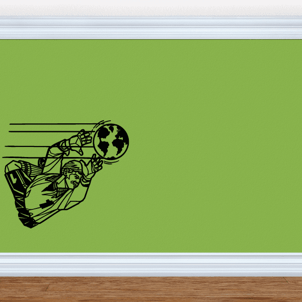 Soccer player wall decal in black, kicking a soccer ball