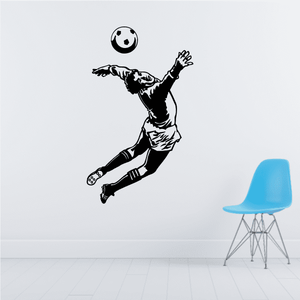 Soccer wall decal vinyl of a black soccer player jumping with ball above